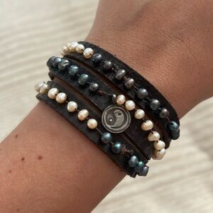 Wrap bracelet with pearls and yin-yang charm